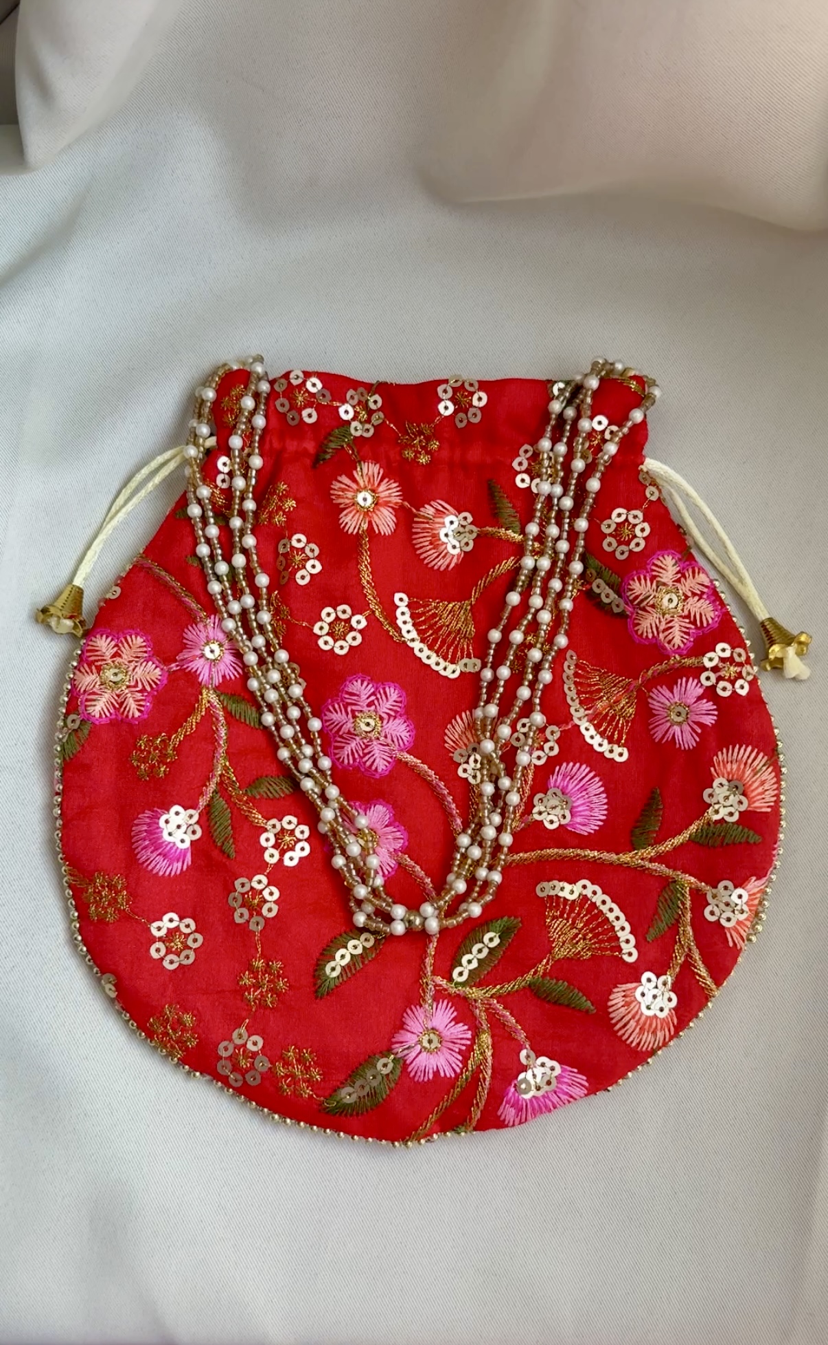 Red Potlis to match your ethnic wear Red Potlis to match your ethnic wear