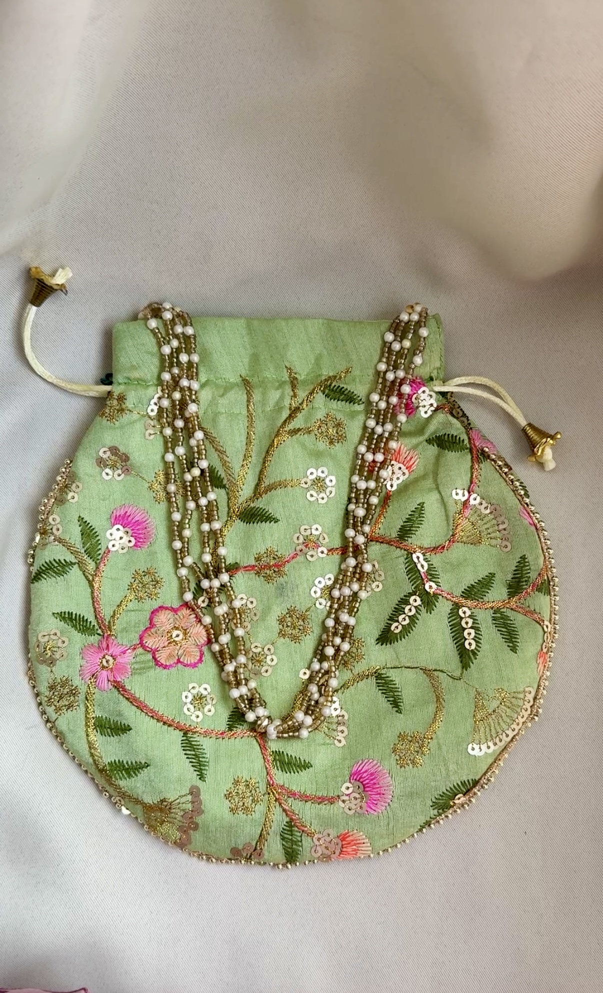 Potlis to Match Your Ethnic Wear (Parrot Green) Potlis to Match Your Ethnic Wear (Parrot Green)